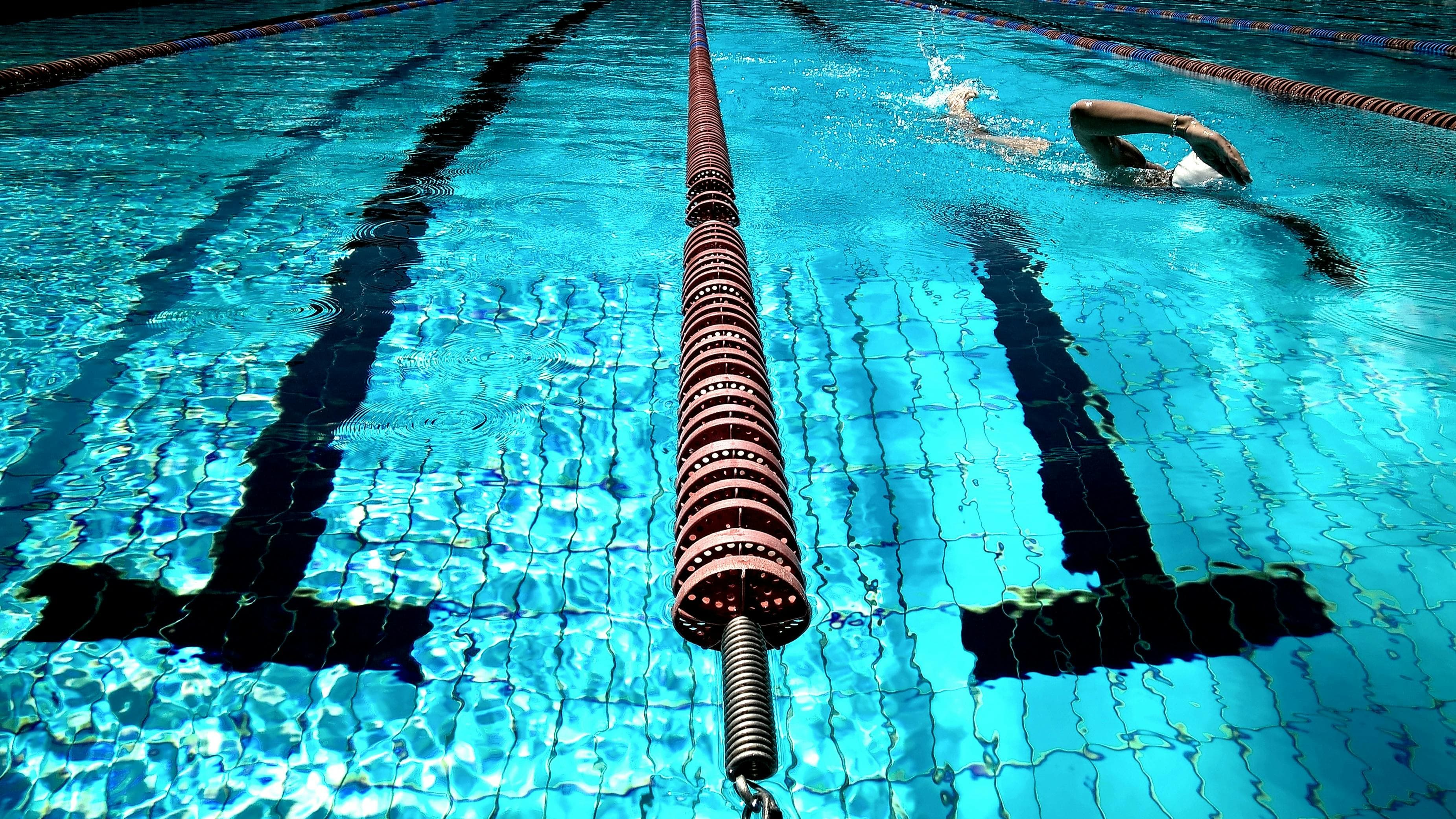 Indoor lap pool with lane ropes used for Like a Fish swim lessons in Edmond, Oklahoma